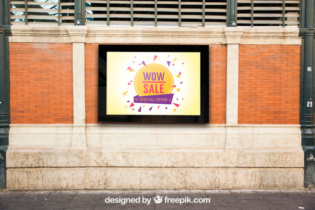 Free Mockup Of Billboard On City Wall Psd