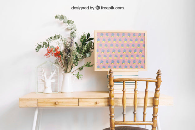 Free Mockup Of Frame On Decorative Desk Psd