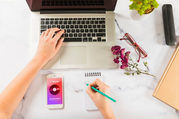 Free Mockup Of Hand Writing On Notepad With Laptop And Smartphone Psd