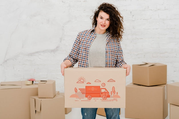 Free Mockup Of Woman With Cardboard Boxes Psd