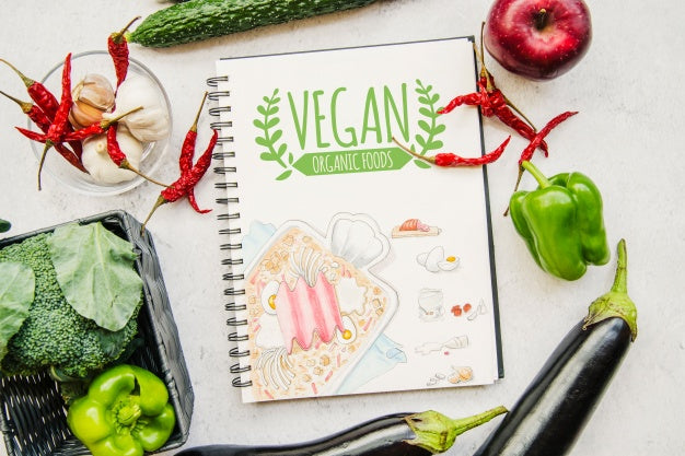 Free Notebook Mockup With Vegan Food Psd