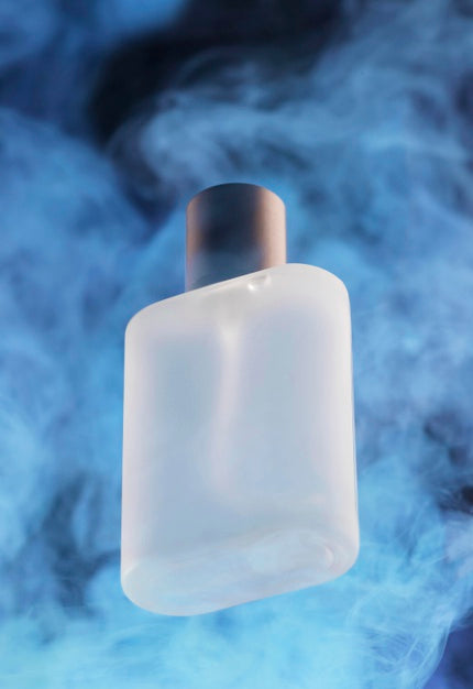 Free Perfume Bottle And Blue Smoke Psd