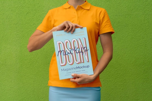 Free Person Reading Color Pop Magazine With Cover Mockup Psd