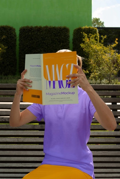 Free Person Reading Color Pop Magazine With Cover Mockup Psd
