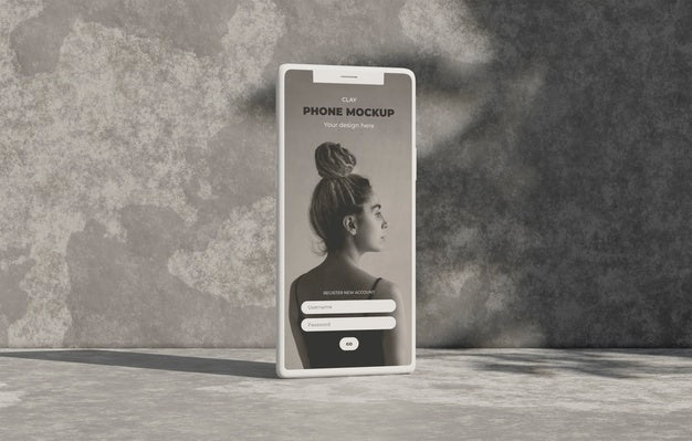 Free Phone Mockup On Concret Wall With Shadow Psd