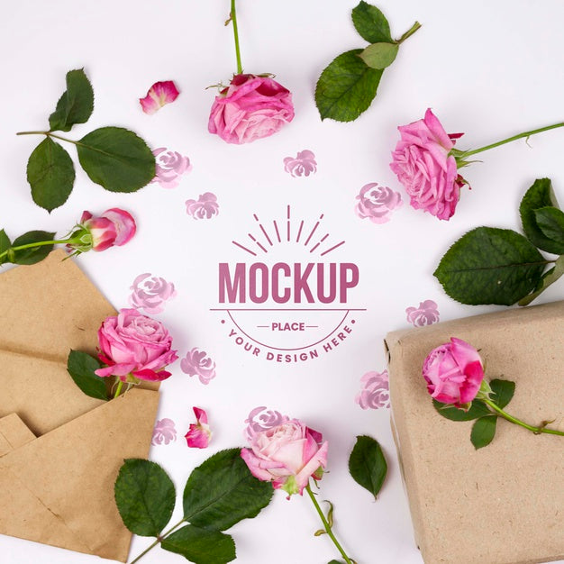 Free Pink Roses Framing Mockup Next To Envelopes Psd