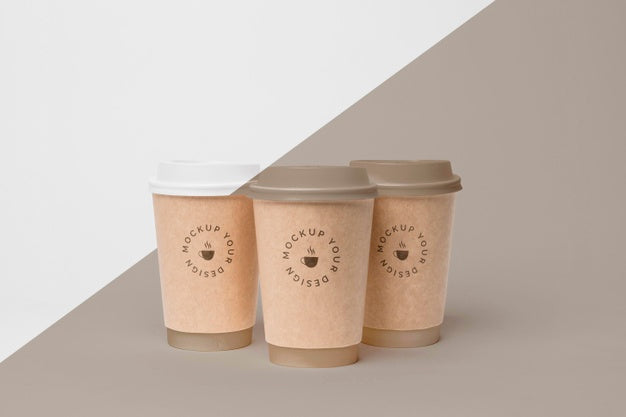 Free Plastic Cup With Coffee Mock Up On Table Psd