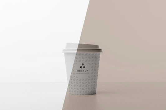 Free Plastic Cup With Coffee Mock Up On Table Psd