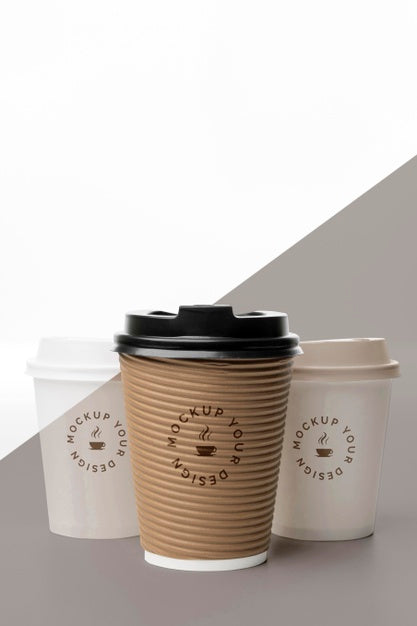 Free Plastic Cups With Coffee Mock Up On Table Psd