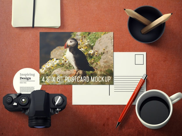 Free Postcard On Desktop Mock Up Psd