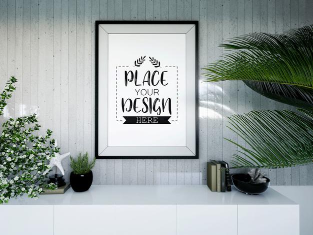 Free Poster Frame Mockup On The Wall With Plant Psd