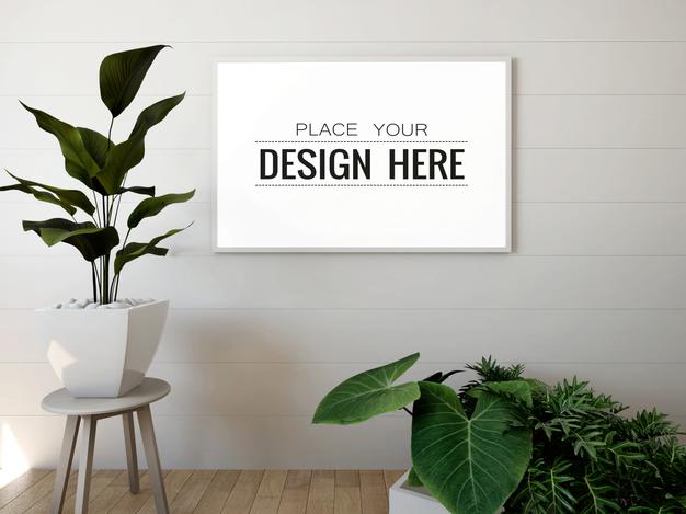 Free Poster Frame Mockup On The Wall With Plant Psd