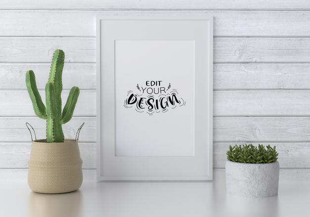 Free Poster Frame Mockup On The Wall With Plant Psd