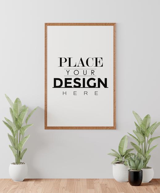 Free Poster Frame Mockup On The Wall With Plant Psd