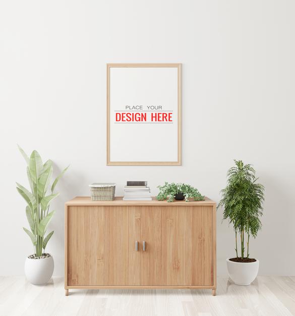 Free Poster Frame Mockup On The Wall With Plant Psd