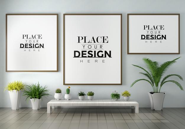 Free Poster Frame Mockup On The Wall With Plant Psd