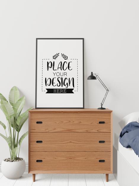 Free Poster Frame Mockup On The Wall With Plant Psd