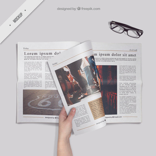 Free Reading an Open Newspaper or Magazine Mockup