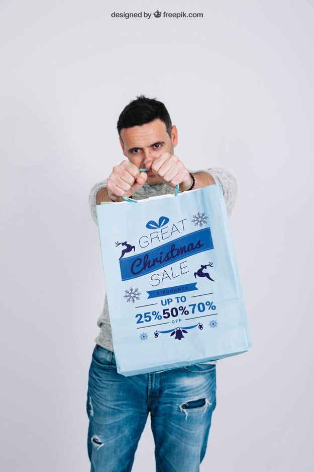 Free Shopping Bag Mockup With Young Man Psd