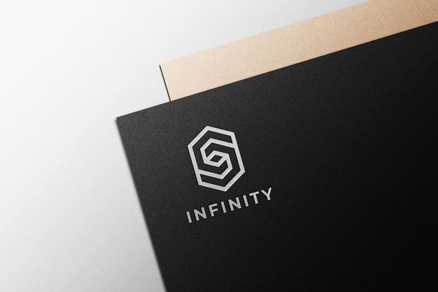 Free Silver Logo Mockup On Black Paper Psd