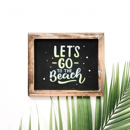 Free Slate Mockup With Palm Tree Leaf Psd