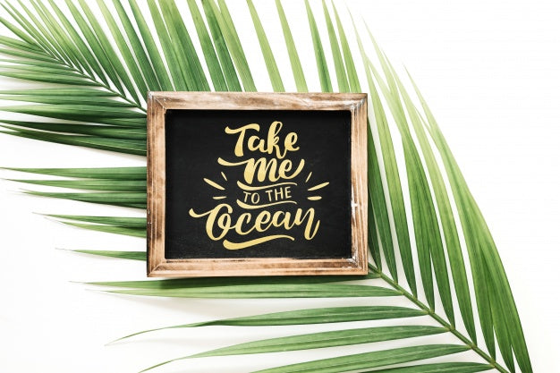 Free Slate Mockup With Palm Tree Leaf Psd