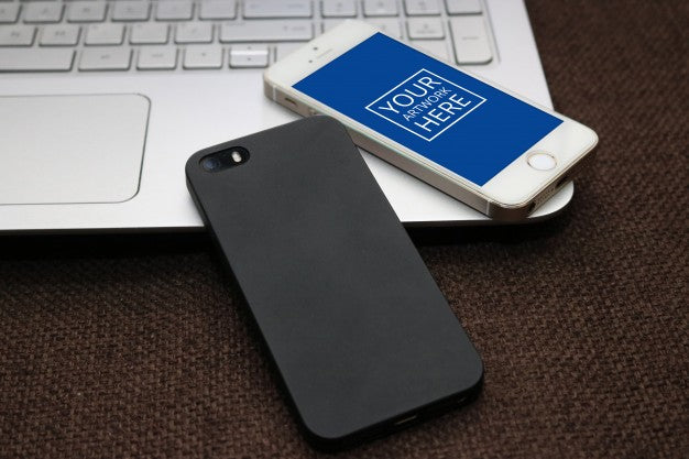 Free Smartphone Lying On Laptop Psd