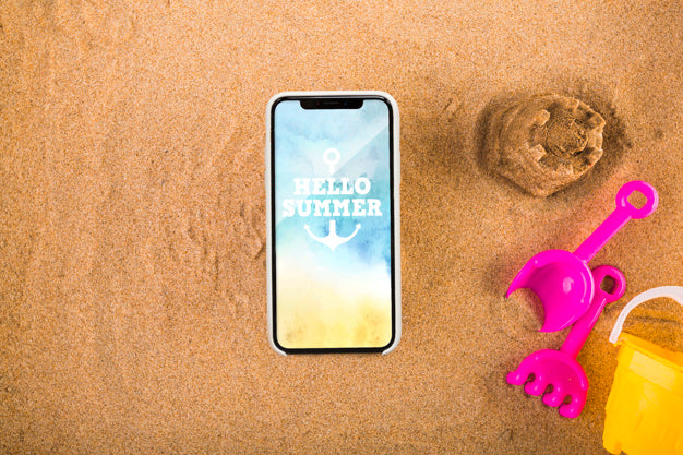 Free Smartphone Mockup On Sand Psd