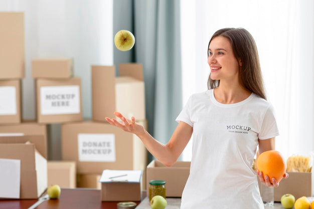 Free Smiley Female Volunteer Tossing Apple In The Air Psd