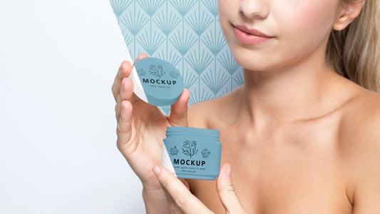 Free Smiley Woman Holding A Skincare Product Mock-Up Psd