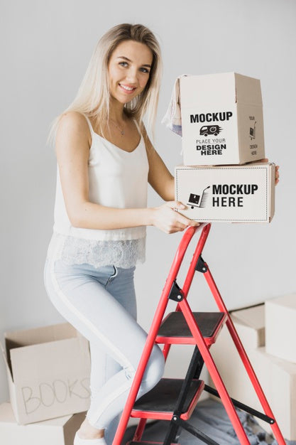 Free Smiley Woman Holding Boxes Psd