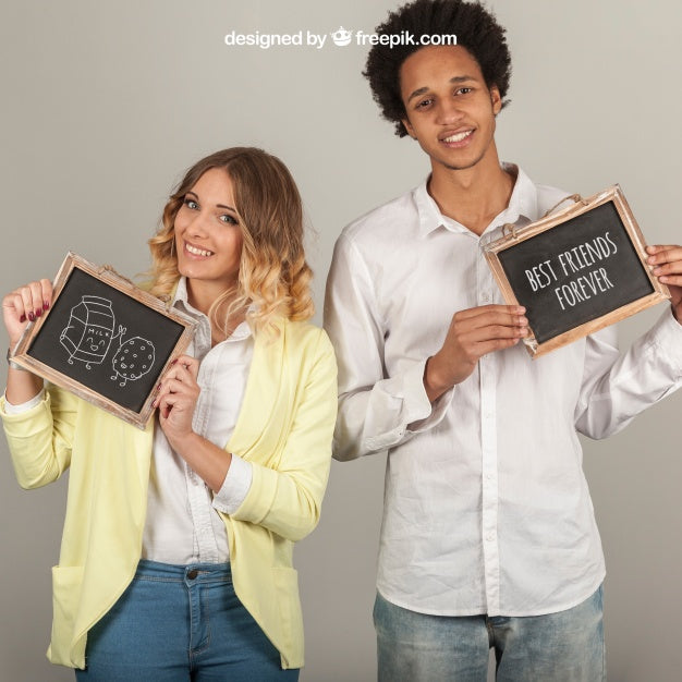 Free Smiling Couple Holding Slates Psd