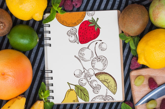 Free Spiral Notebook Mockup With Fruits Psd