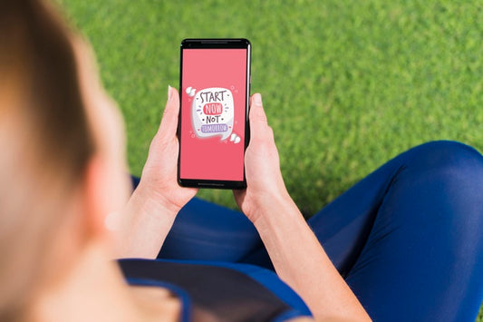 Free Sporty Woman Using Smartphone Mockup Psd