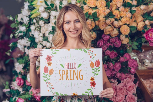 Free Spring Concept With Woman Holding Paper Mockup Psd