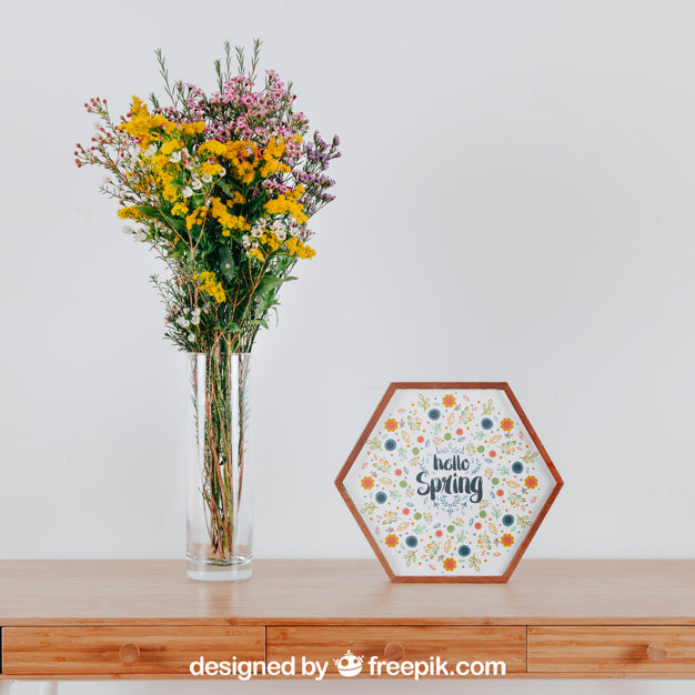 Free Spring Mockup With Hexagonal Frame And Vase Of Flowers Over Table Psd