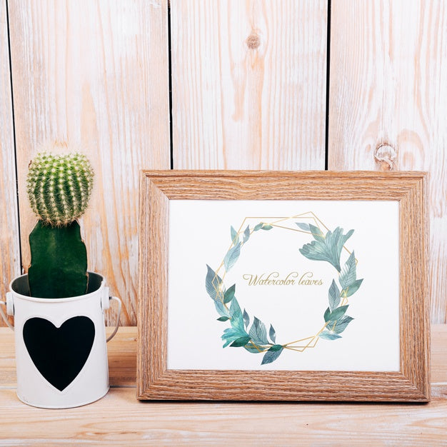 Free Spring Mockup With Wooden Frame And Cactus Psd