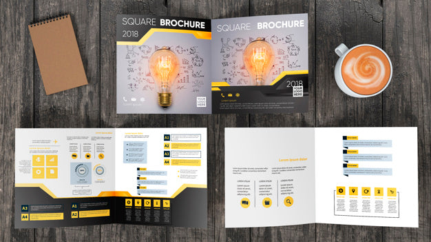 Free Square Brochure Mockup On Wooden Surface Psd