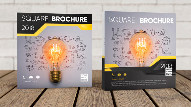 Free Square Brochure Mockup On Wooden Surface Psd