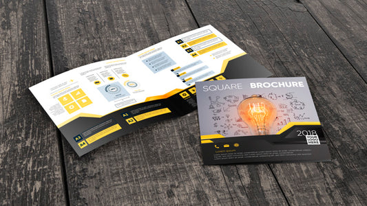 Free Square Brochure Mockup On Wooden Surface Psd