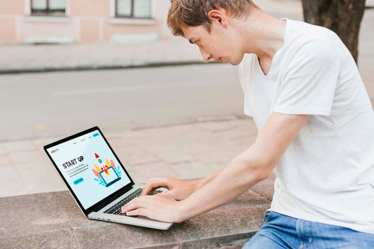 Free Student Working On Laptop Outdoors Psd