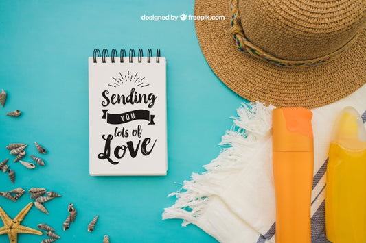 Free Summer Decoration With Notepad On Blue Background Psd