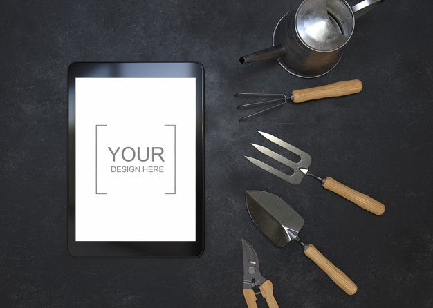 Free Tablet Mockup With Gardening Tools Psd