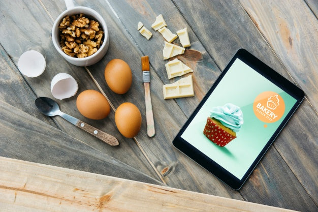 Free Tablet Mockup With Kitchen Concept Psd