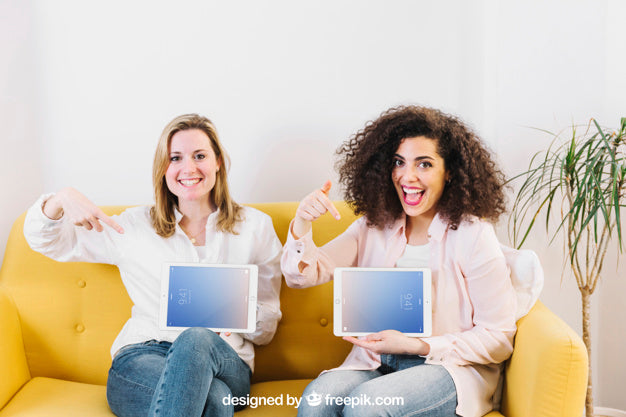 Free Technology Mockup With Women On Yellow Couch Psd