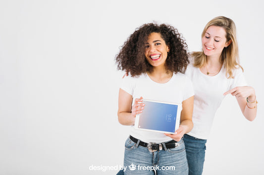 Free Technology Mockup With Women Showing Tablet Psd