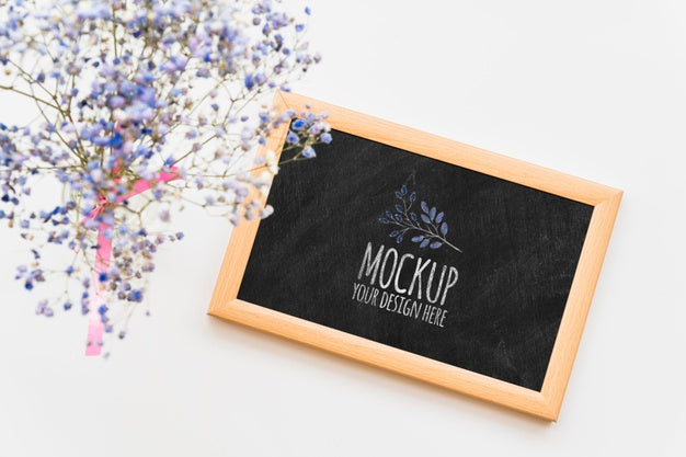 Free Top View Blue Flowers On Blackboard Psd