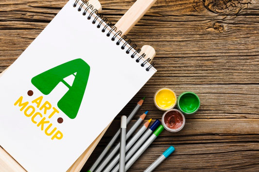 Free Top View Colorful Paint On Wooden Background Psd