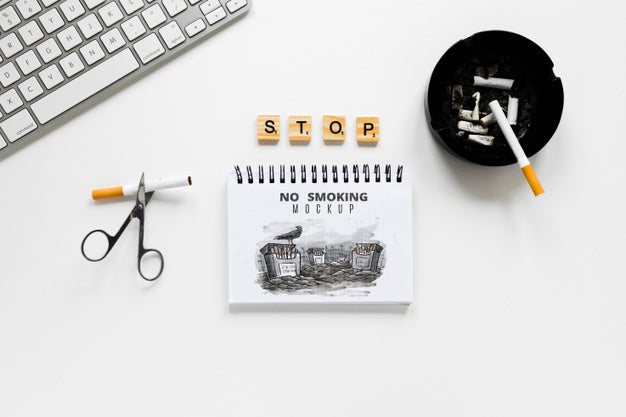 Free Top View Desk Arrangement With Cigarettes Psd