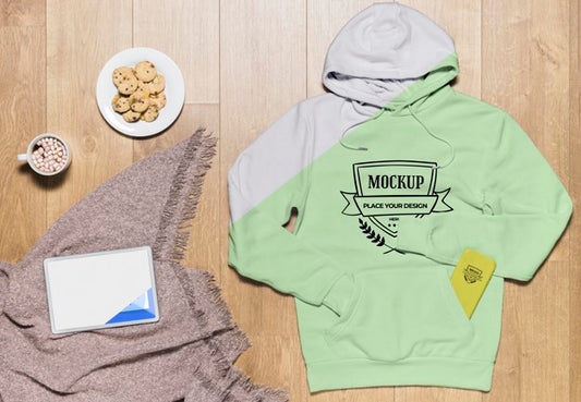 Free Top View Hoodie Mock-Up With Snack And Tablet Psd